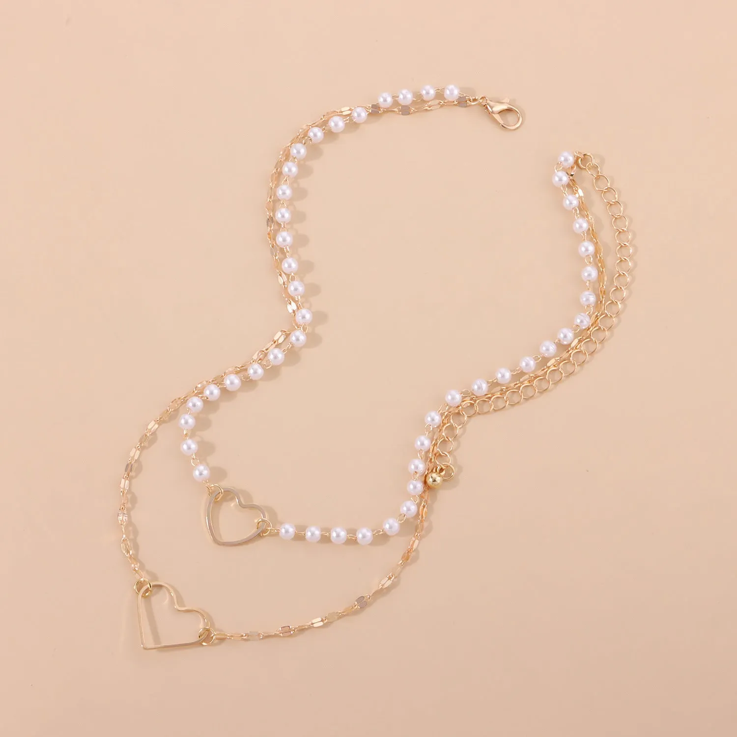 Gold heart-shaped zinc alloy pendant necklace on adjustable chain