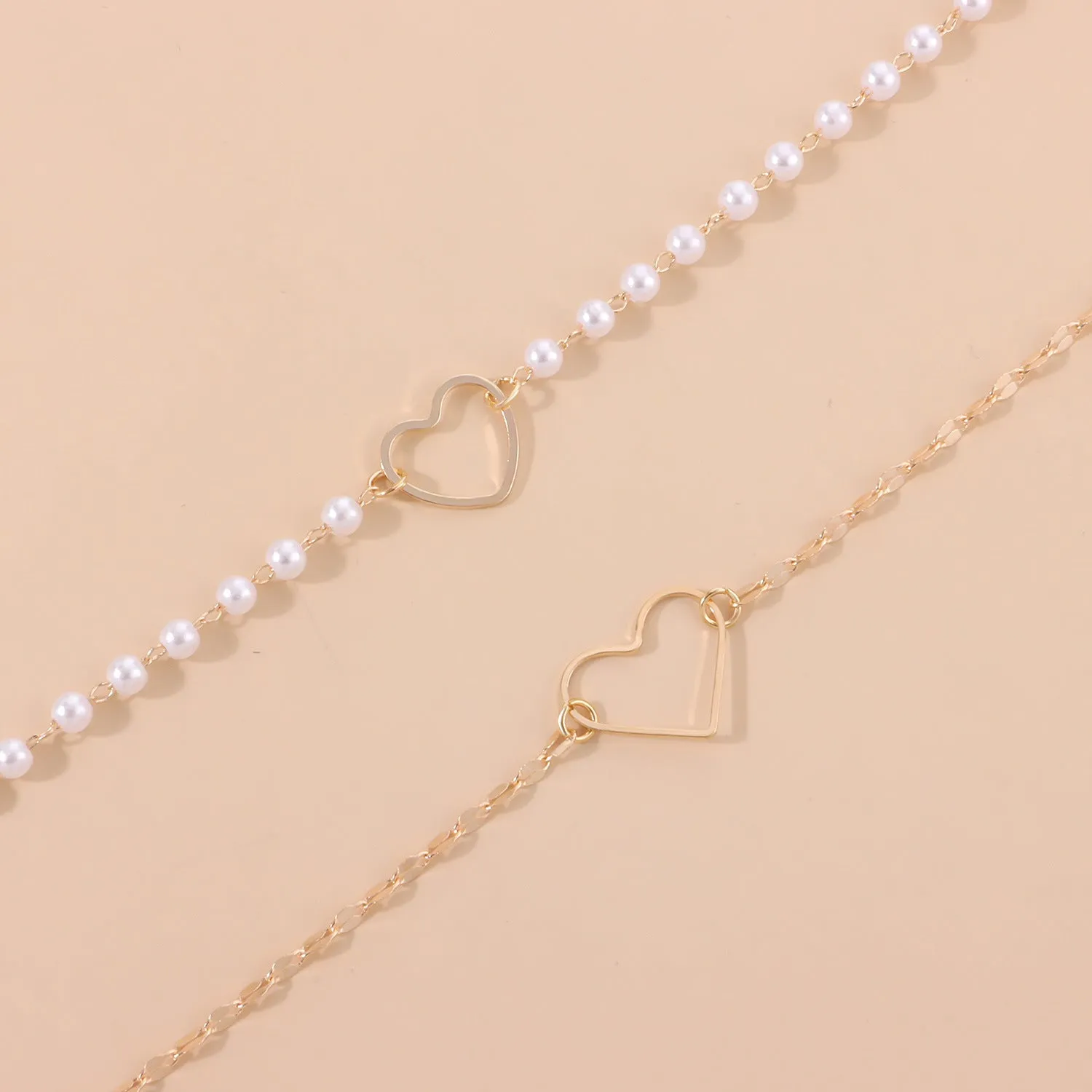 Gold heart-shaped zinc alloy pendant necklace on adjustable chain