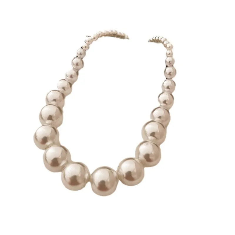 French retro gradient white imitation pearl necklace with U-shaped drape and ball bead chain for women
