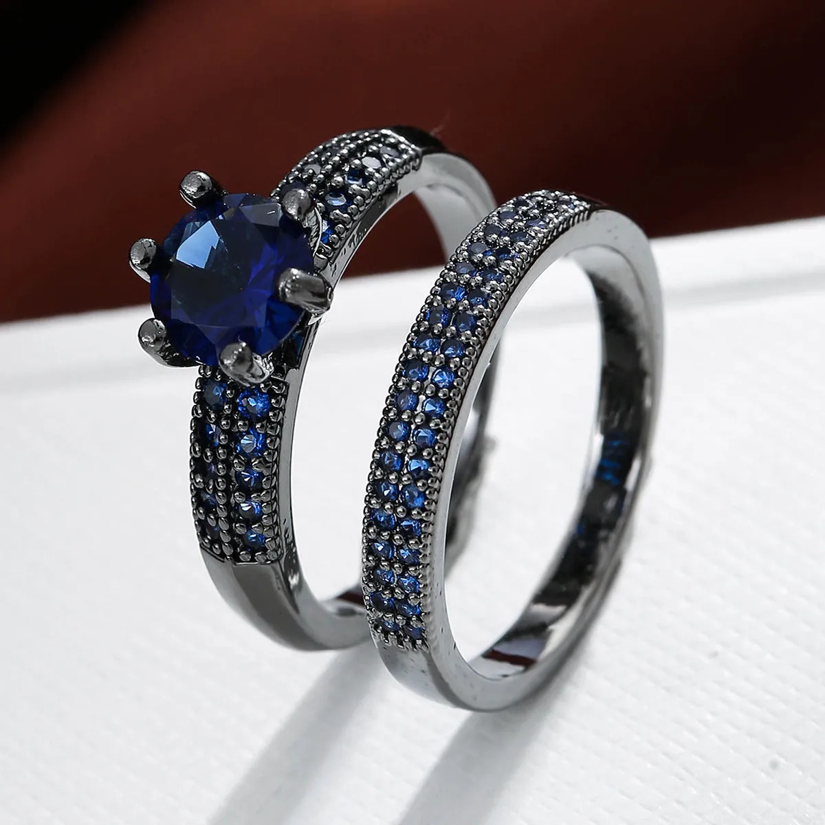 Copper zircon hollow ring with geometric design in golden-white zirconium finish