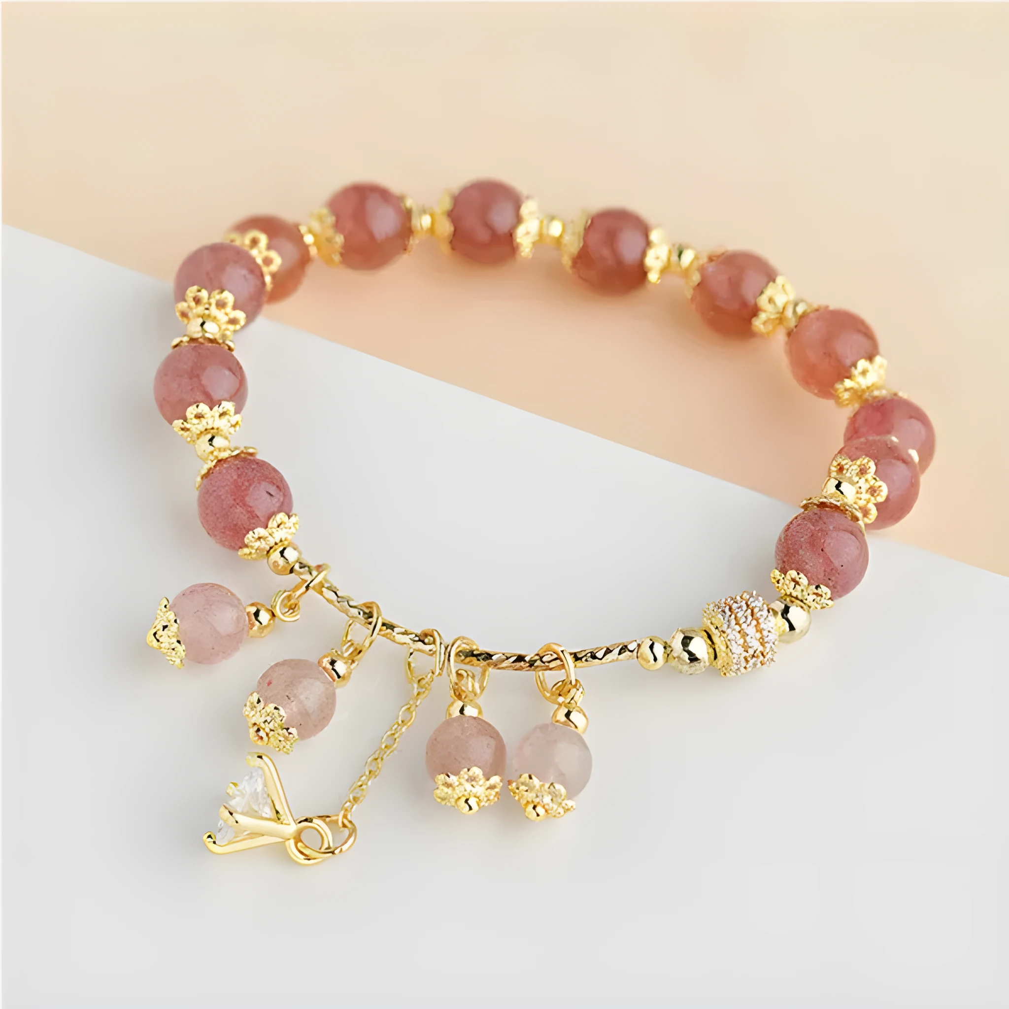 Pink strawberry quartz crystal bracelet with heart shape and pearl accents for women