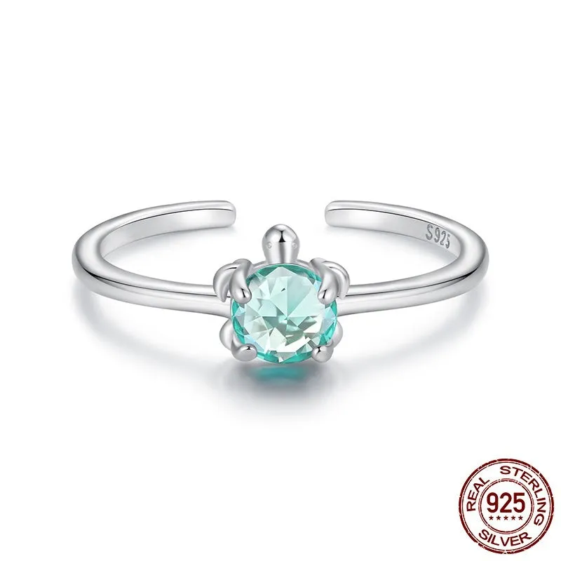 S925 sterling silver turtle ear studs and ring set on white background, electroplated 925 silver jewellery for women