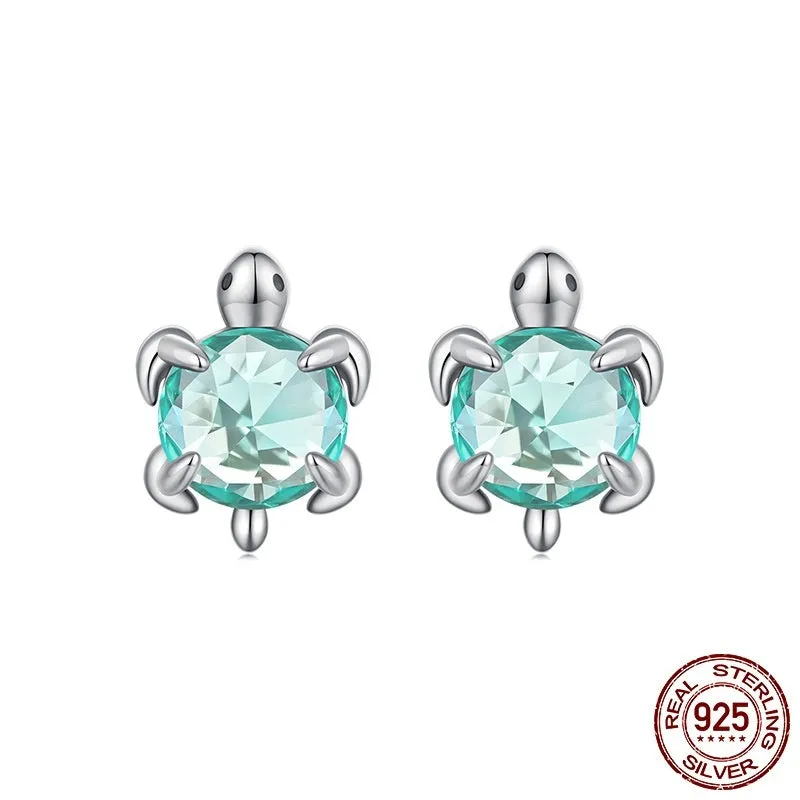 S925 sterling silver turtle ear studs and ring set on white background, electroplated 925 silver jewellery for women