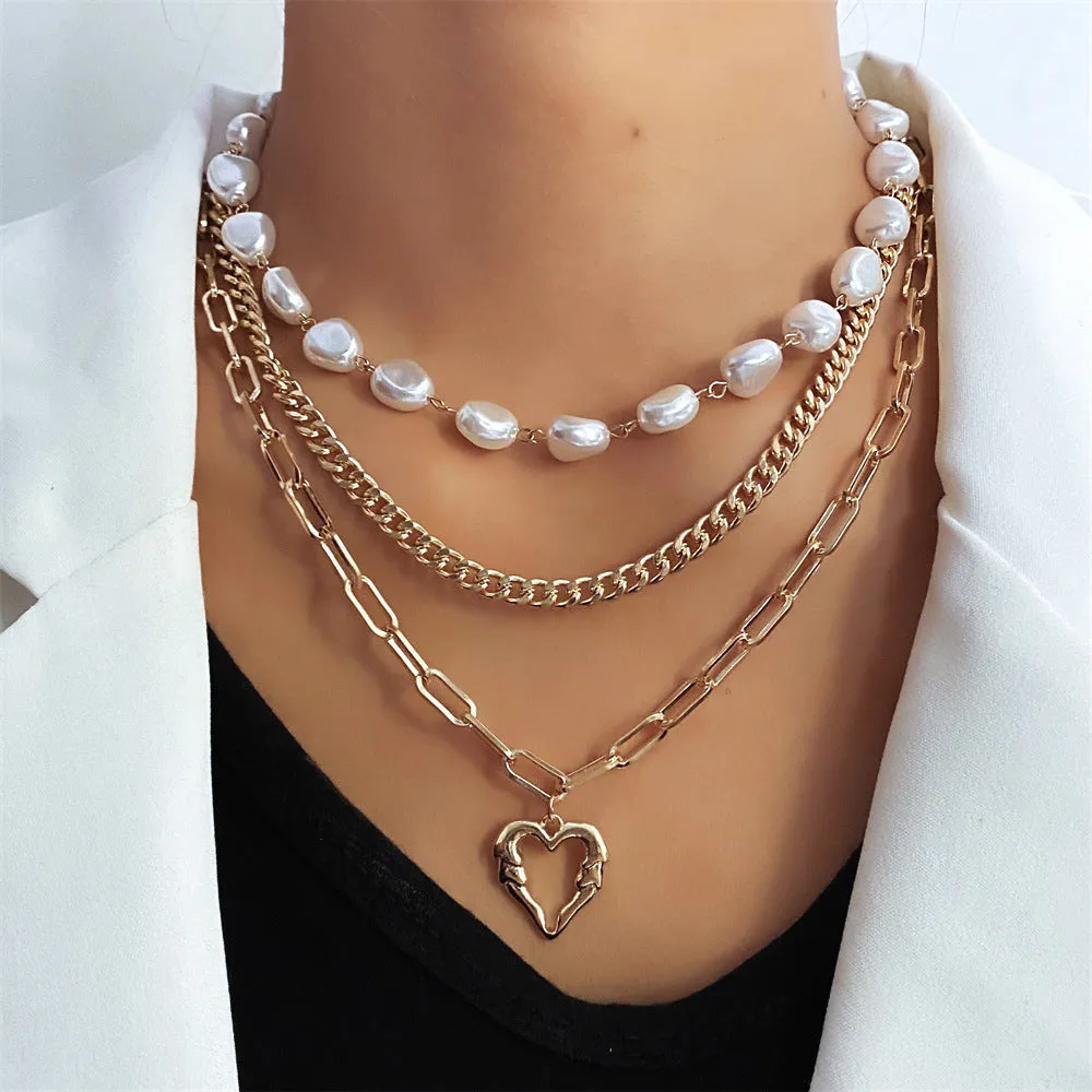 Vintage gold tone necklace with heart pendant on pearl chain, adjustable 41-50cm length
