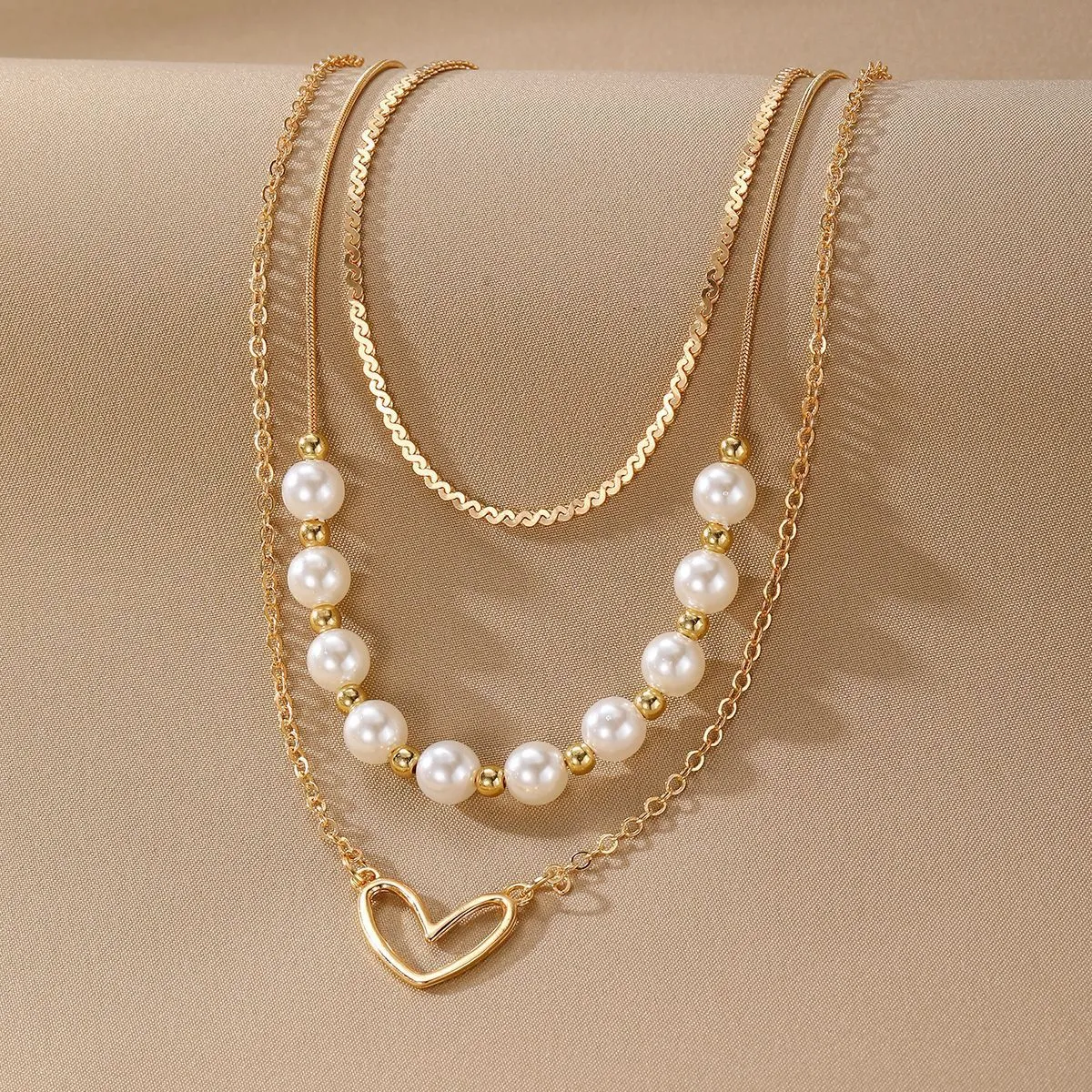 Vintage gold tone necklace with heart pendant on pearl chain, adjustable 41-50cm length