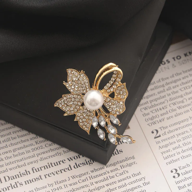 Alloy brooch in natural flower shape with electroplated finish, featuring adjustable and anti-exposure pin closure for women's coats and suits.