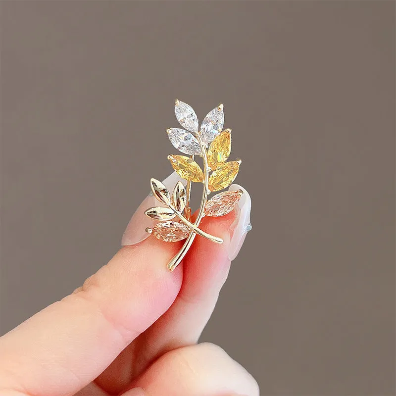 Alloy brooch in natural flower shape with electroplated finish, featuring adjustable and anti-exposure pin closure for women's coats and suits.