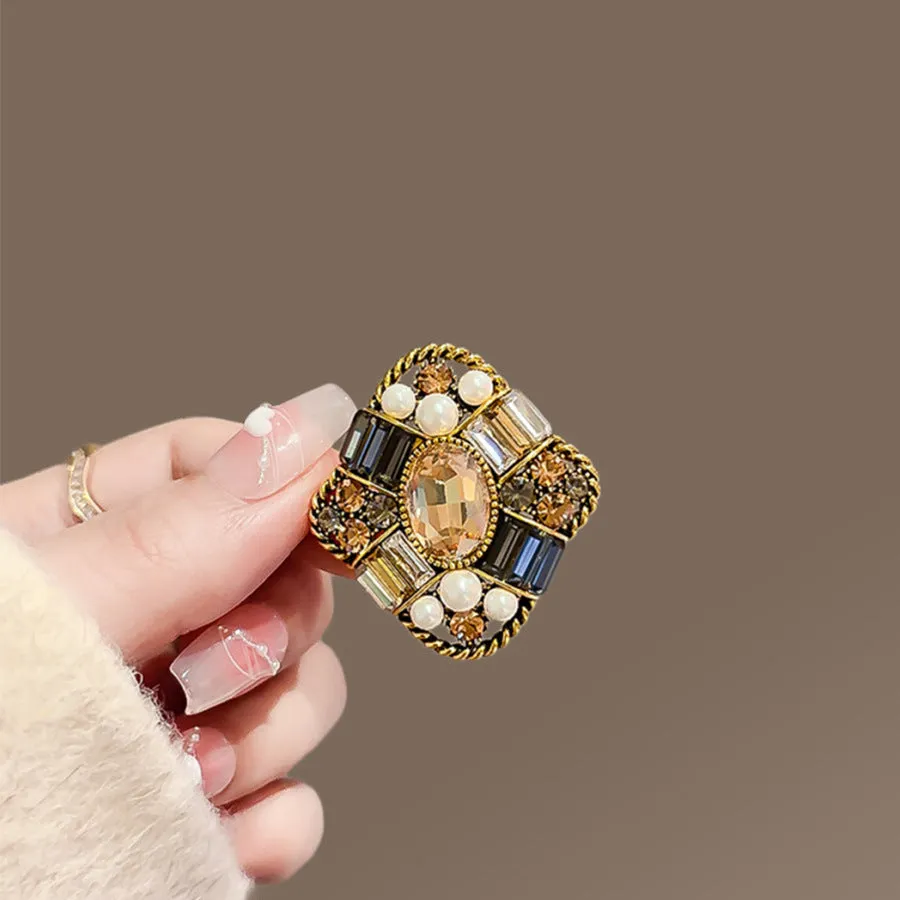 Alloy brooch in natural flower shape with electroplated finish, featuring adjustable and anti-exposure pin closure for women's coats and suits.