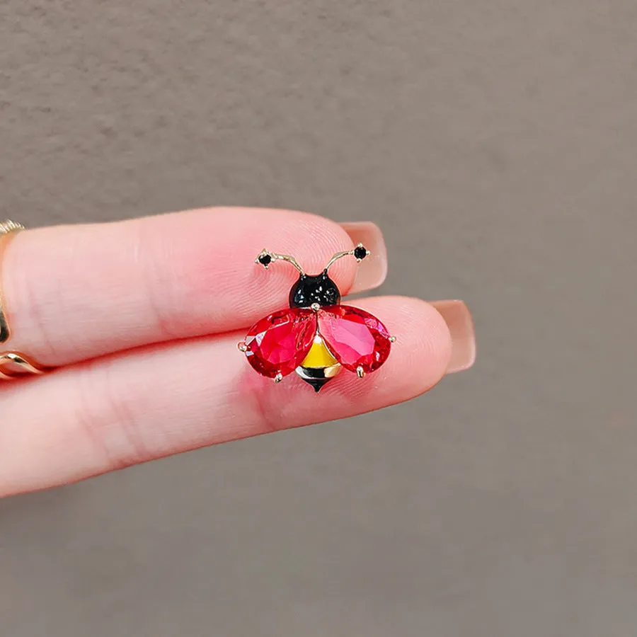 Alloy brooch in natural flower shape with electroplated finish, featuring adjustable and anti-exposure pin closure for women's coats and suits.