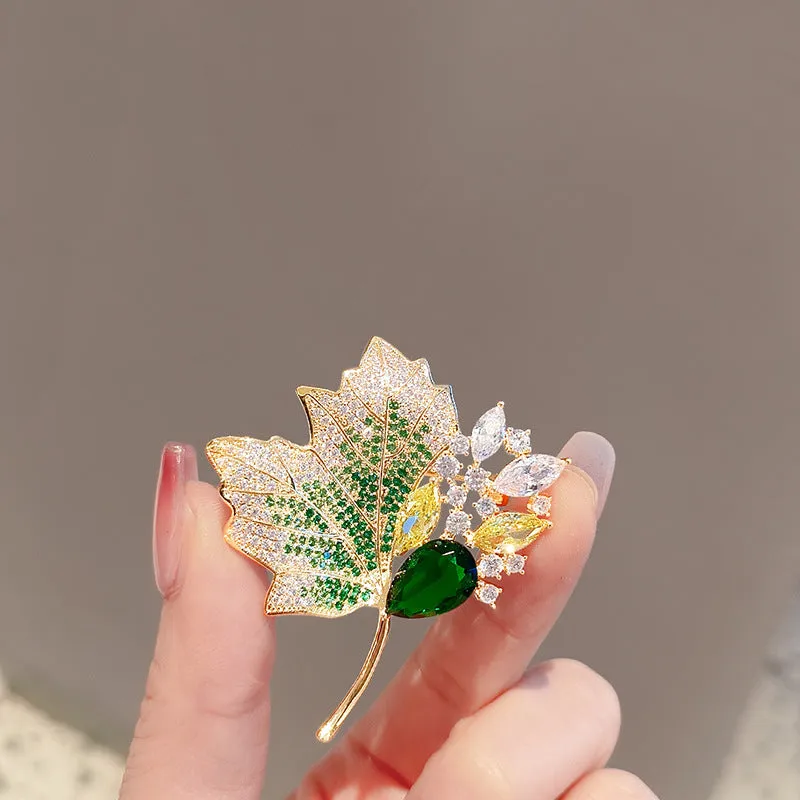 Alloy brooch in natural flower shape with electroplated finish, featuring adjustable and anti-exposure pin closure for women's coats and suits.