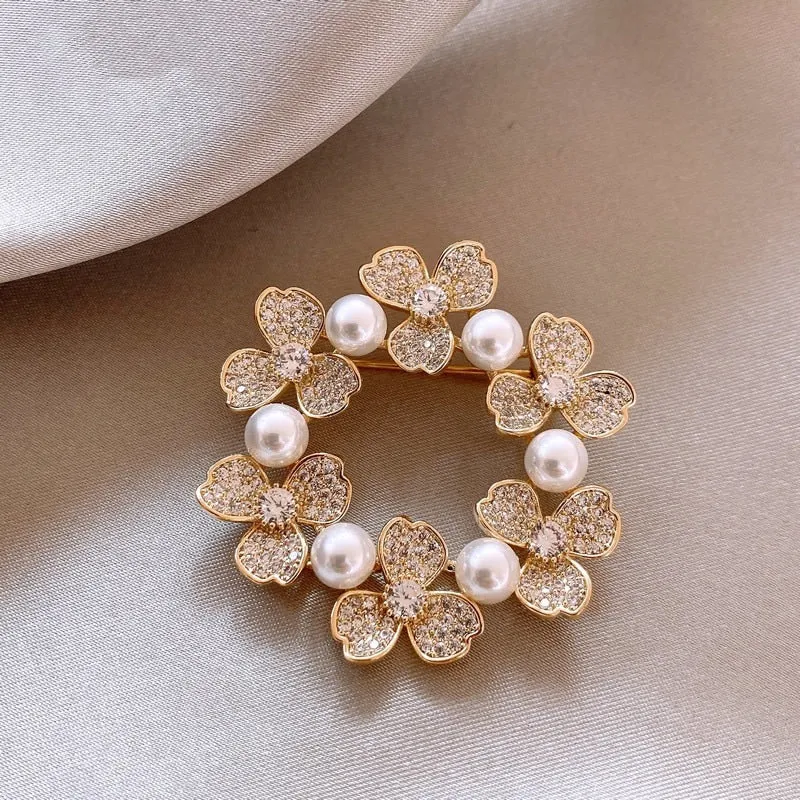 Alloy brooch in natural flower shape with electroplated finish, featuring adjustable and anti-exposure pin closure for women's coats and suits.