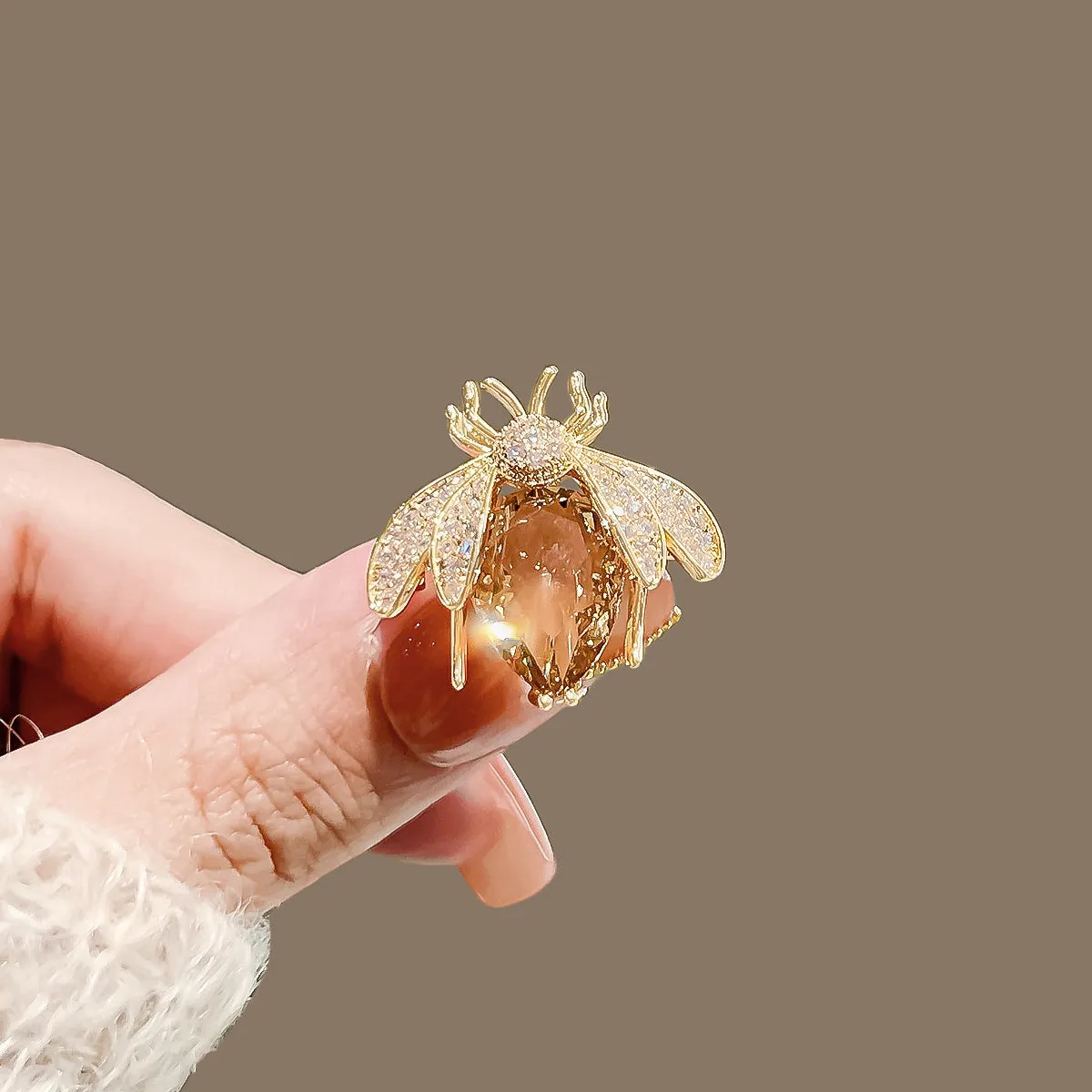 Alloy brooch in natural flower shape with electroplated finish, featuring adjustable and anti-exposure pin closure for women's coats and suits.