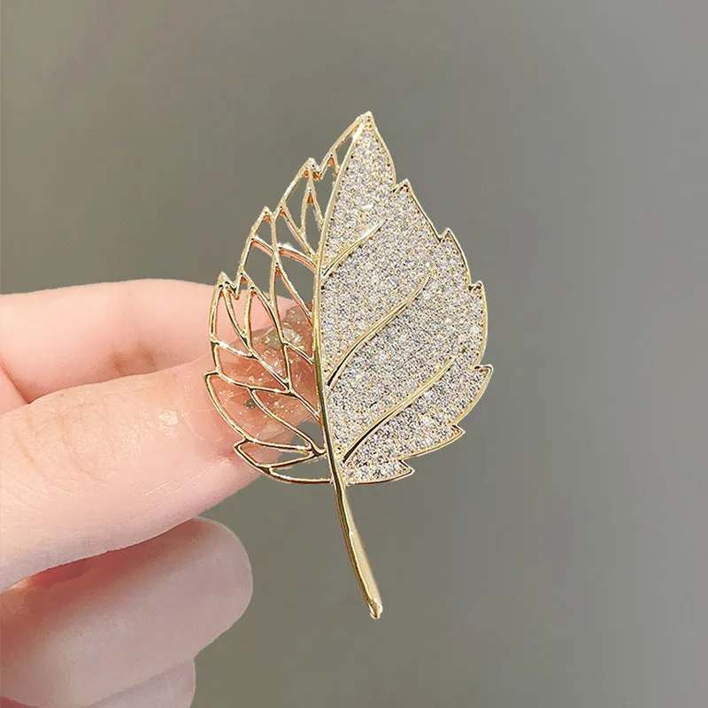 Alloy brooch in natural flower shape with electroplated finish, featuring adjustable and anti-exposure pin closure for women's coats and suits.