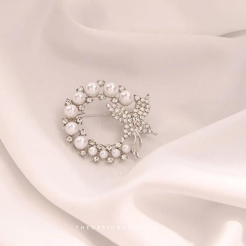 Alloy brooch in natural flower shape with electroplated finish, featuring adjustable and anti-exposure pin closure for women's coats and suits.