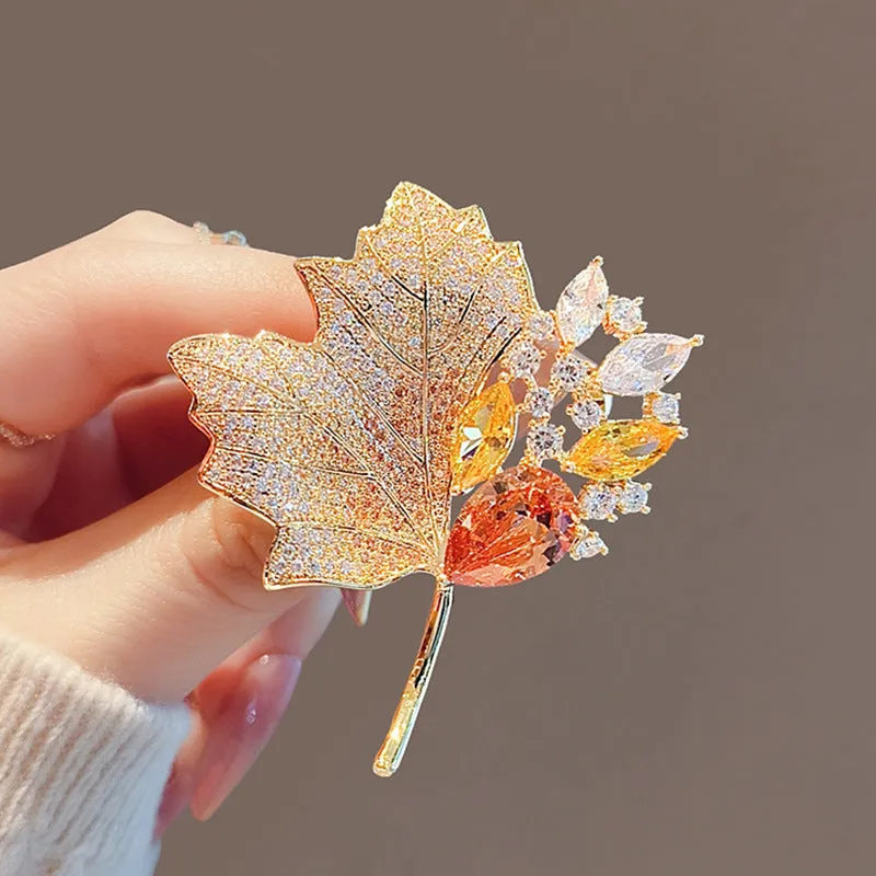 Alloy brooch in natural flower shape with electroplated finish, featuring adjustable and anti-exposure pin closure for women's coats and suits.
