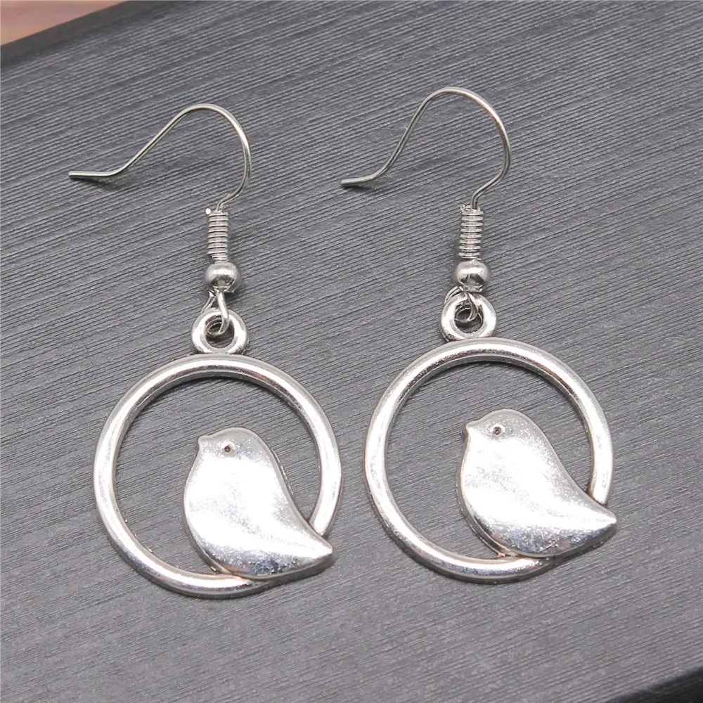 Retro simple handmade ornament bird earrings in ancient silver with zinc alloy body and iron ear hooks