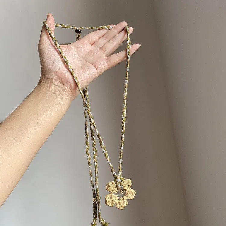 Gold hibiscus rosa-sinensis resin pendant necklace with artificial crystal bow on alloy chain for ladies