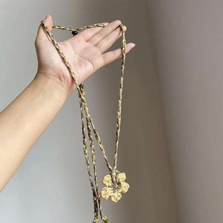 Gold hibiscus rosa-sinensis resin pendant necklace with artificial crystal bow on alloy chain for ladies