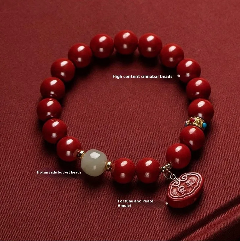 Red cinnabar Emperor Sandstone Ping An Fu Lu adjustable bracelet on wrist.