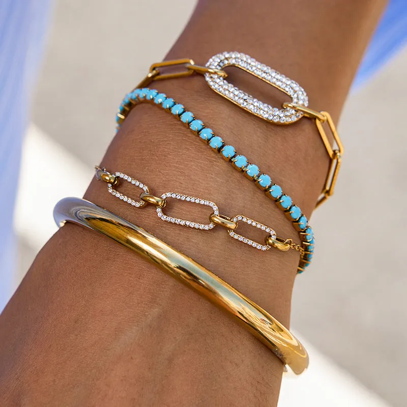 Stainless steel electroplated geometric round link bracelet for women on white background