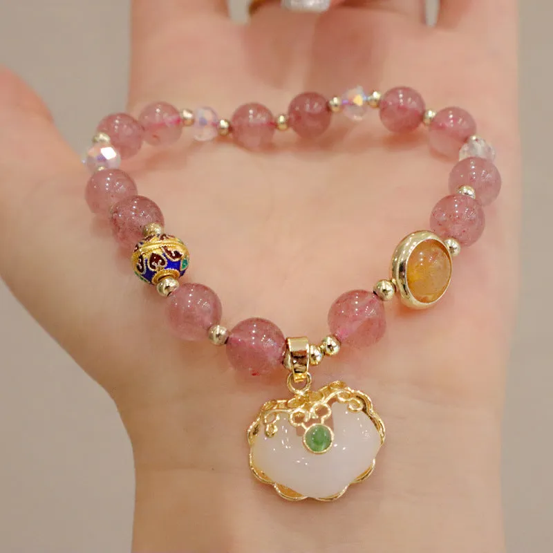 Women's geometric bracelet in choice of gray jade or strawberry quartz with ethnic metal decorations