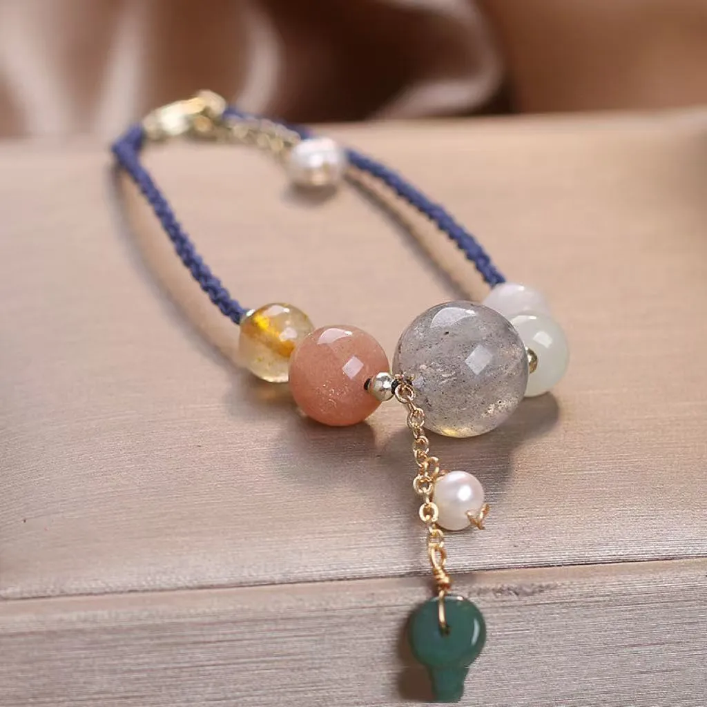 Hand-woven crystal peace buckle bracelet with sequins in blue, green, or red colour options