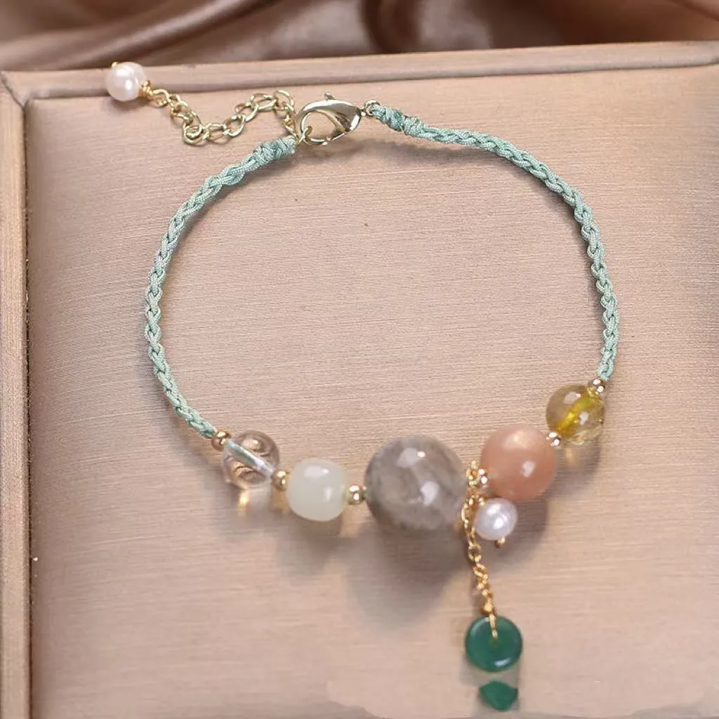 Hand-woven crystal peace buckle bracelet with sequins in blue, green, or red colour options