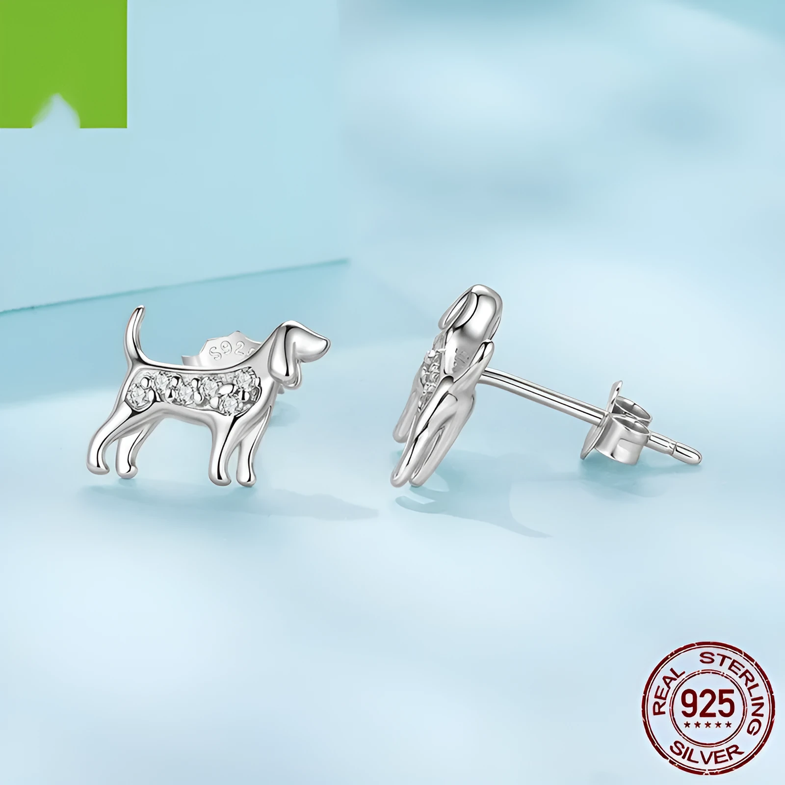 Golden retriever mini ear studs in silver with electroplated finish on a white background
