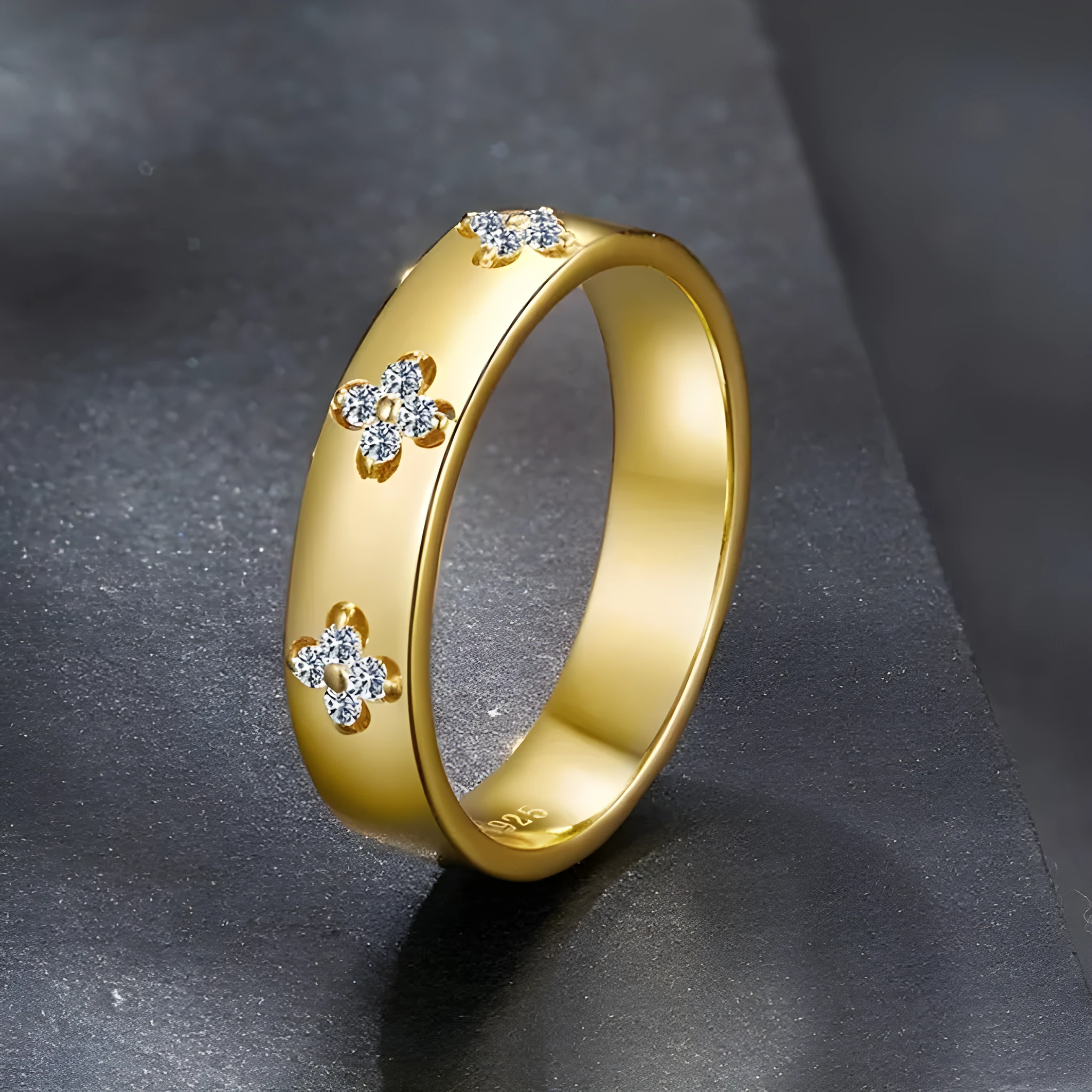 Gold plated sterling silver moissanite wedding ring on finger simple style