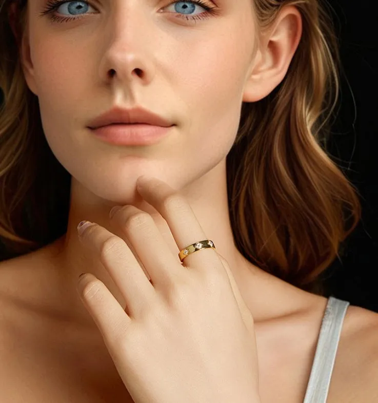 Gold plated sterling silver moissanite wedding ring on finger simple style