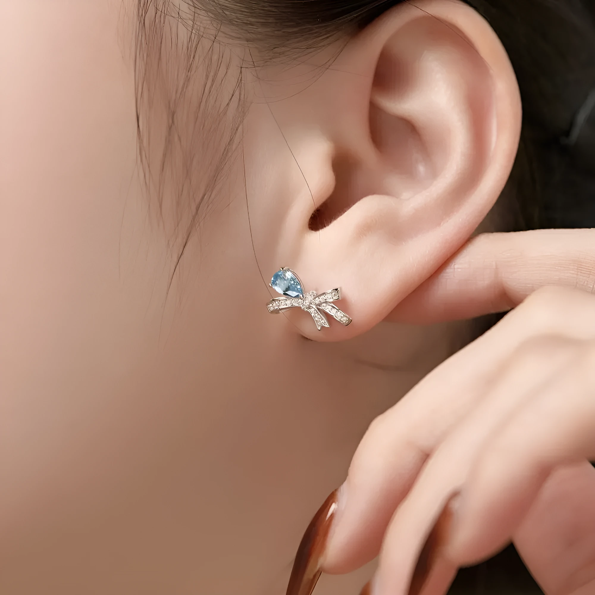 S925 sterling silver butterfly earrings with pear-shaped zircon in blue, pink, and platinum colours