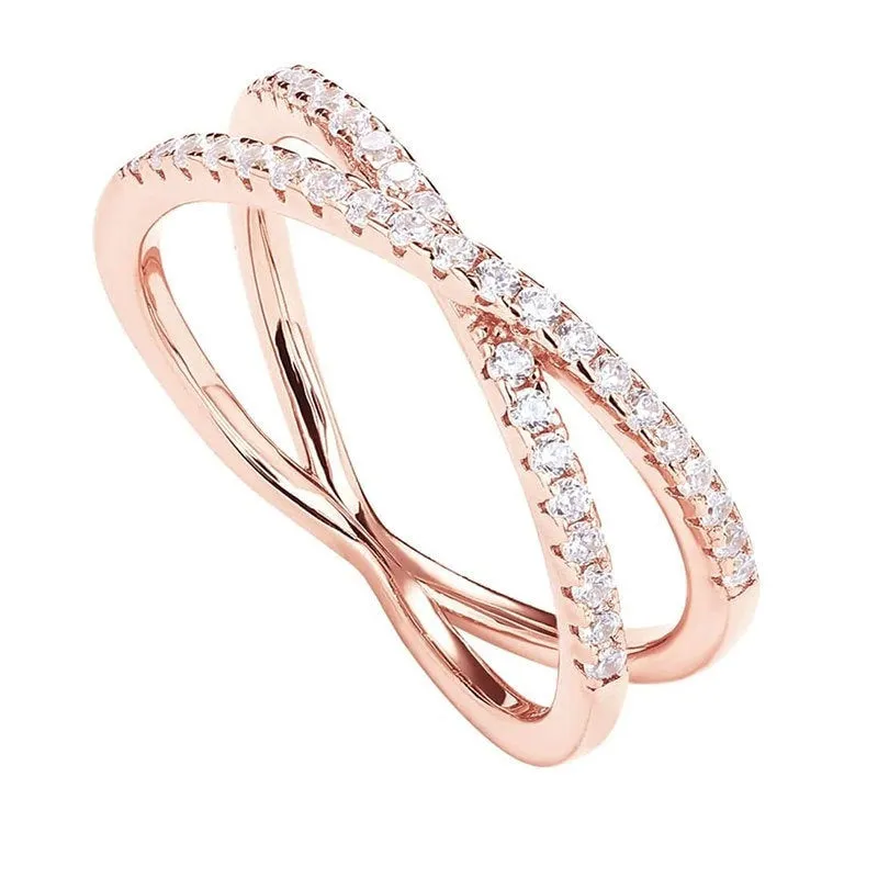Silver cross ring with diamond-embedded half circle wide band in rose colour finish on white background