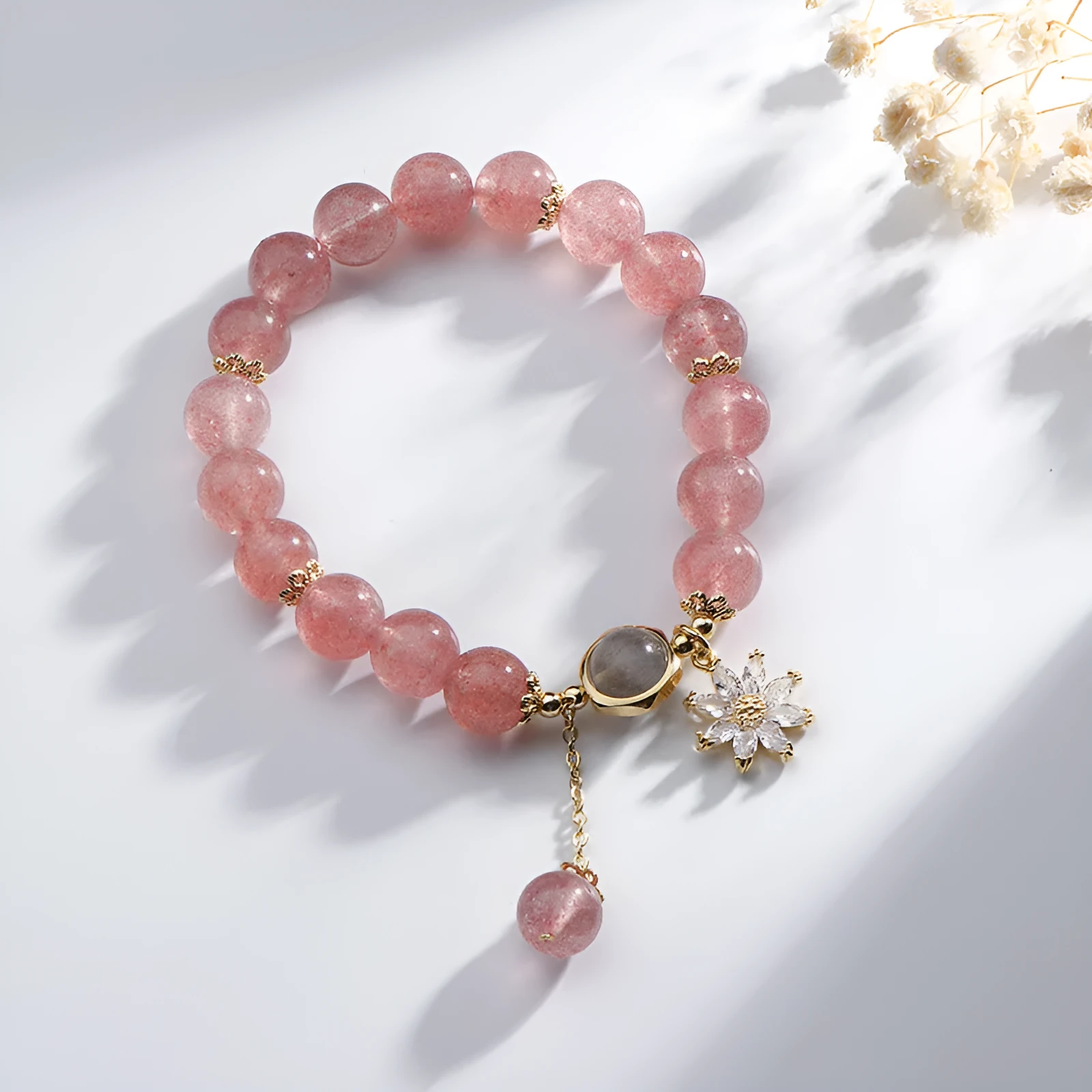 Strawberry quartz crystal bracelet with electroplated floral details in Mori Korean style.