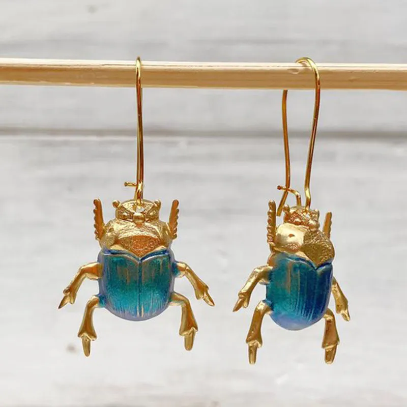 Retro beetle earrings for women, gold metal with electroplated blue finish, creative insect design