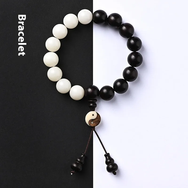 White and blackwood bead bracelet in eight-diagram pattern with natural bodhi seeds