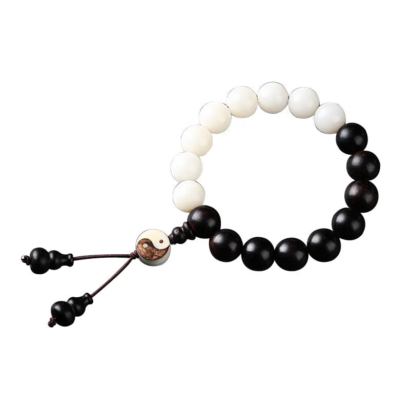 White and blackwood bead bracelet in eight-diagram pattern with natural bodhi seeds