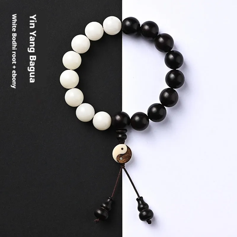 White and blackwood bead bracelet in eight-diagram pattern with natural bodhi seeds