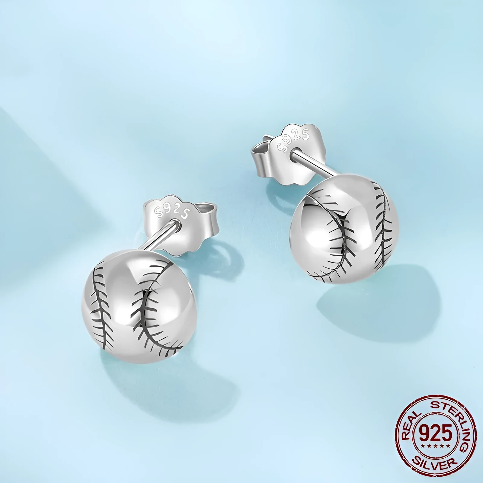 S925 sterling silver baseball stud earrings polished finish silver colour on white background