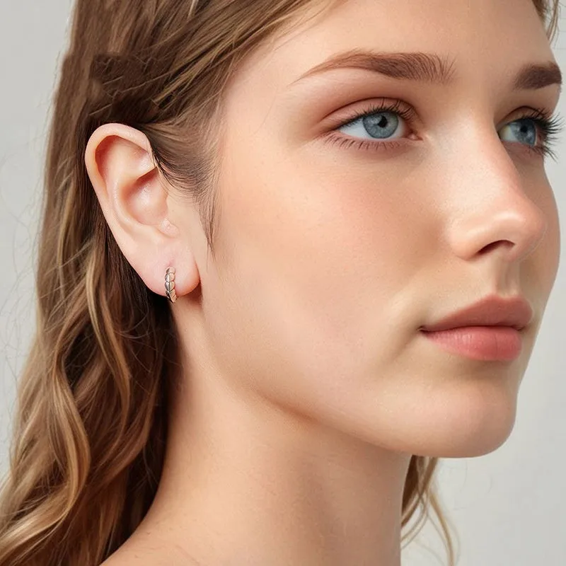 S925 sterling silver loving heart splicing ear clip with polished finish on white background