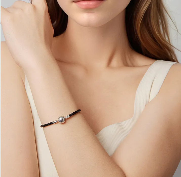 Retro leather rope bracelet with glossy round beads silver buckle base on wrist