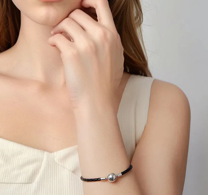 Retro leather rope bracelet with glossy round beads silver buckle base on wrist