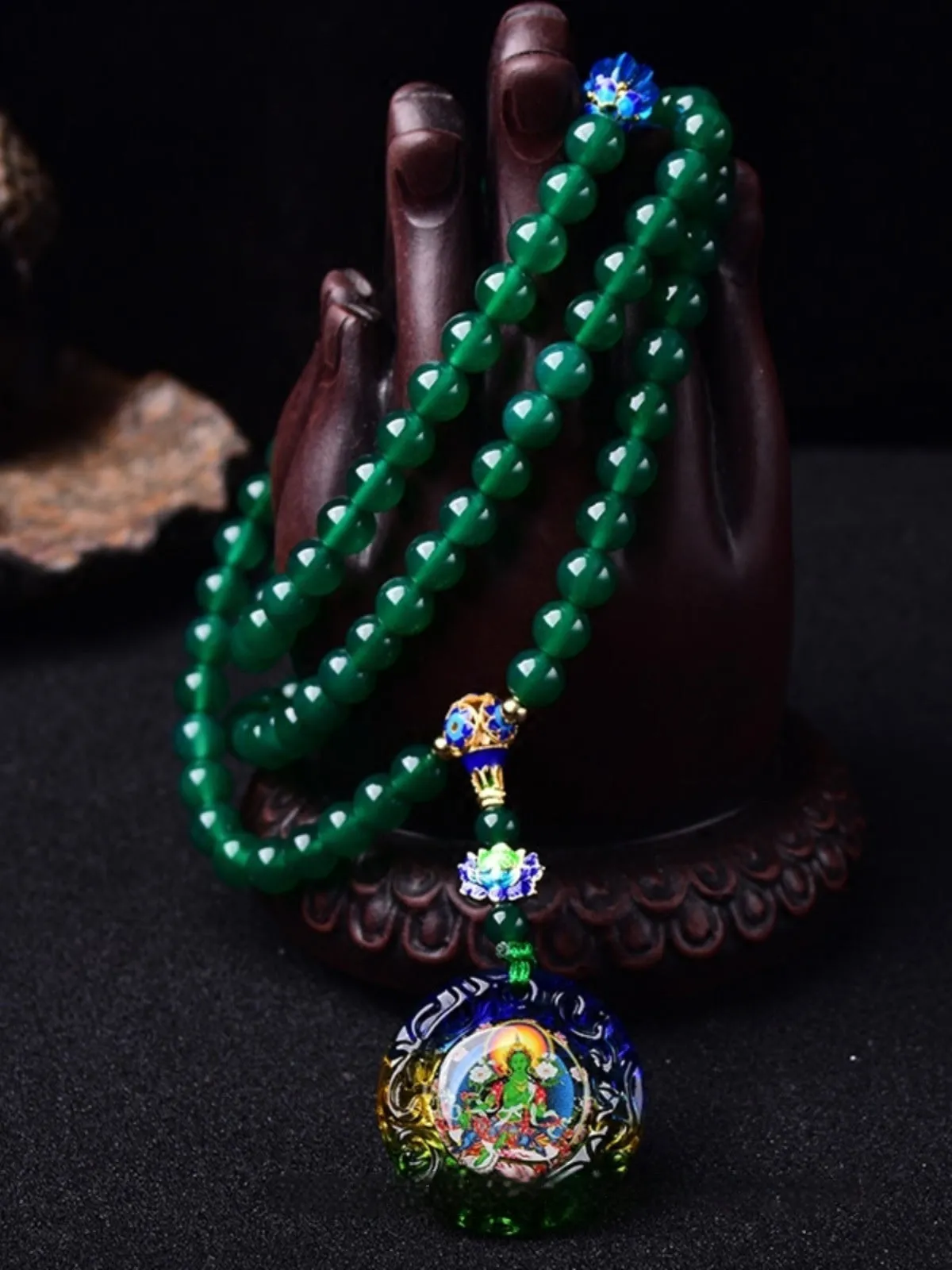 Natural green agate 108 bead bracelet with thangka pendant, worn as a multi-loop unisex accessory.