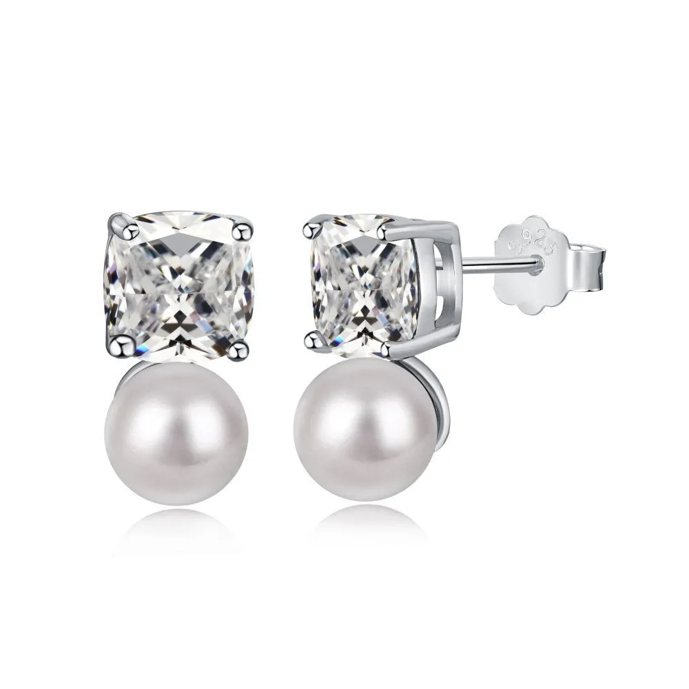 Sterling silver earrings with diamond-shaped zirconium inlay and pearl centre
