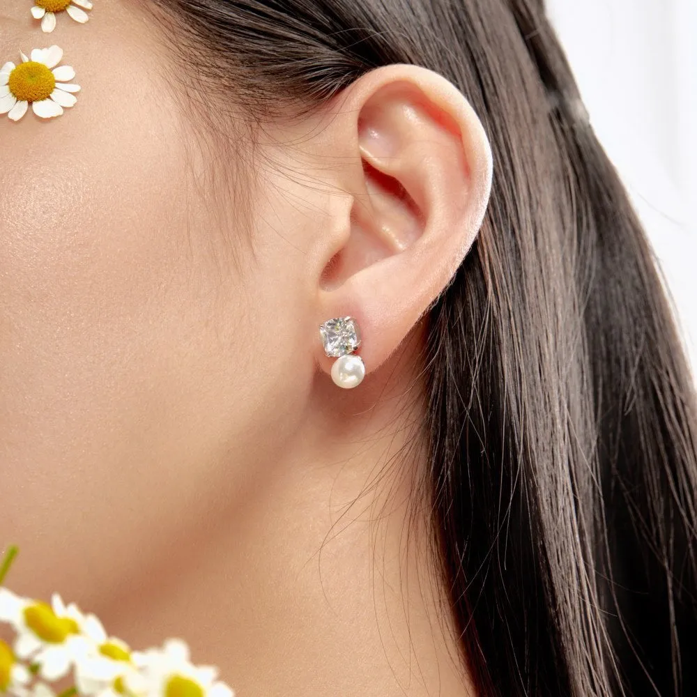 Sterling silver earrings with diamond-shaped zirconium inlay and pearl centre