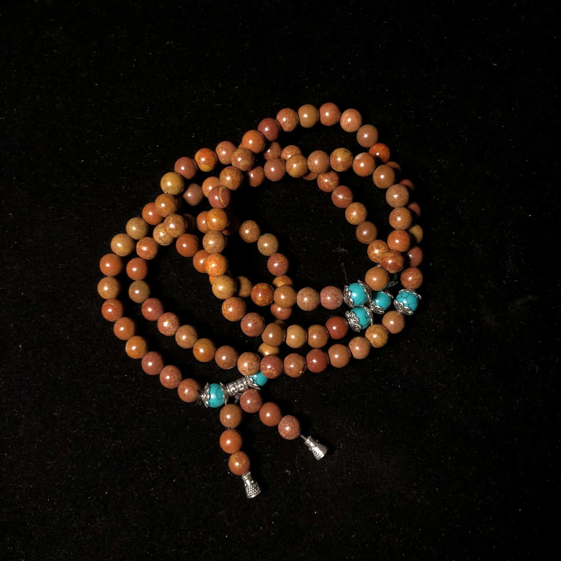 108 bead natural stone bracelet with hand-polished geometric lvzhu beads measuring 5-6mm diameter