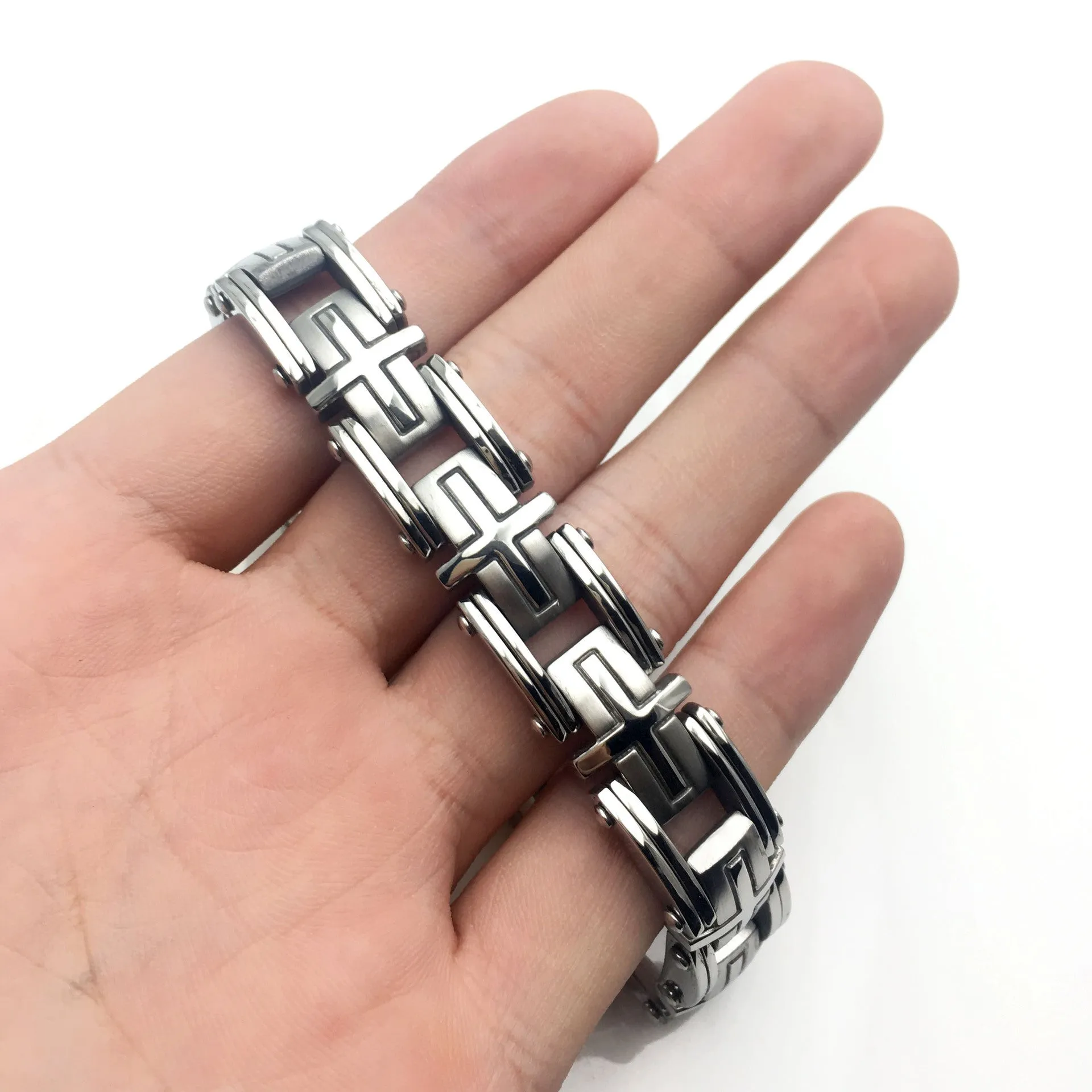 Men's titanium steel bracelet with polished geometric segment design in steel colour