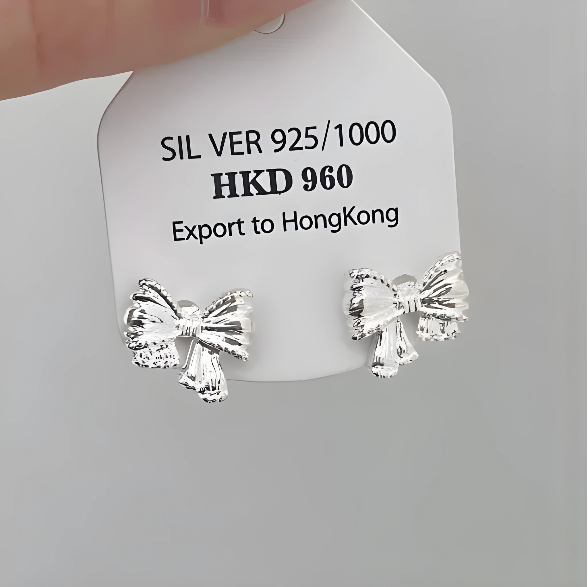 925 silver butterfly stud earrings with 9-10mm A-grade freshwater pearl showing bluish-purple shimmer on white gold plated frame