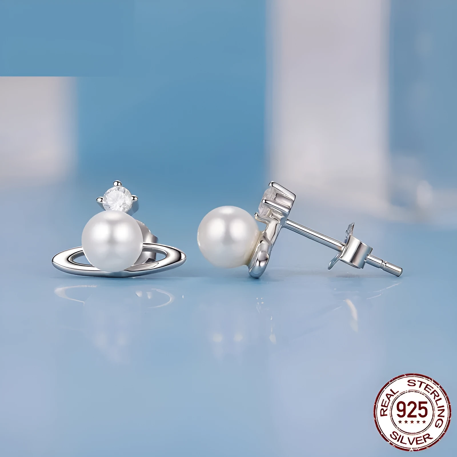 Chuangxing 925 silver star planet ear studs with ball shell pearl detail for women BSE1207