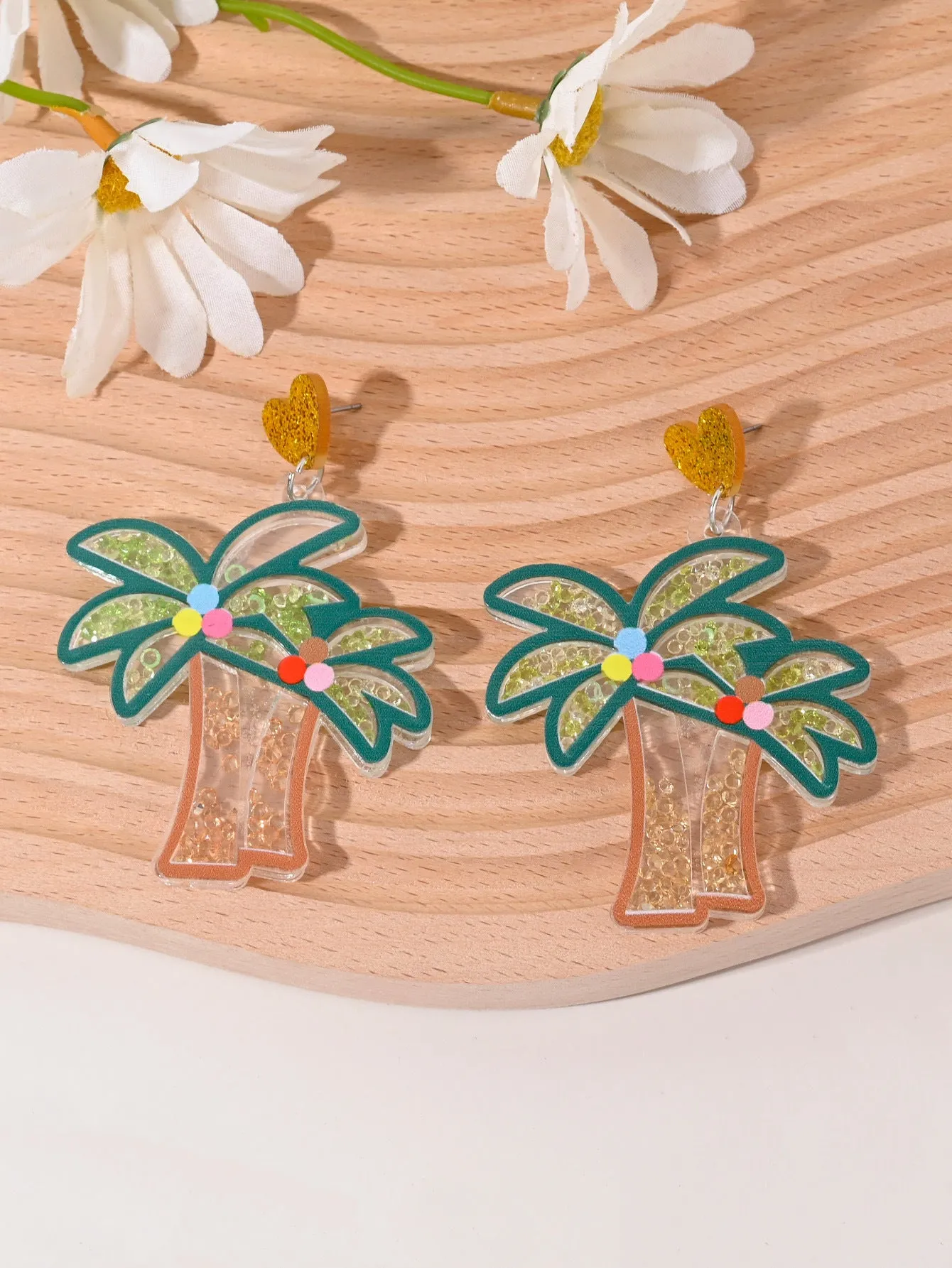 Colourful acrylic earrings with realistic fruit and dessert charms including cherry, strawberry, and ice cream.