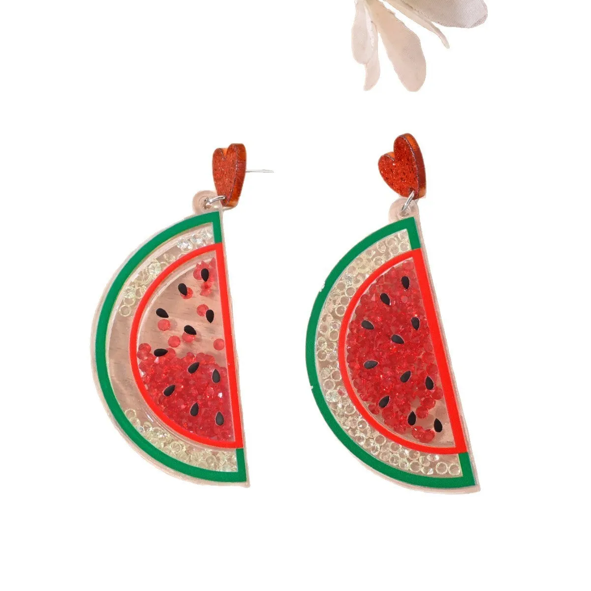 Colourful acrylic earrings with realistic fruit and dessert charms including cherry, strawberry, and ice cream.